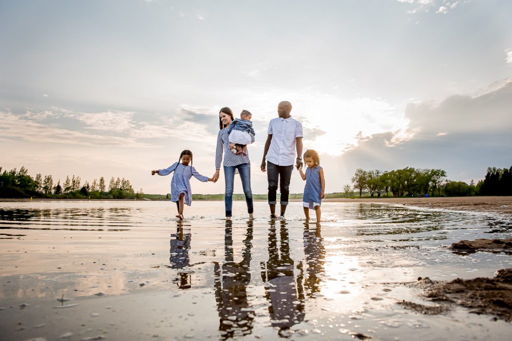A popular beach location for Winnipeg family photography at sunset