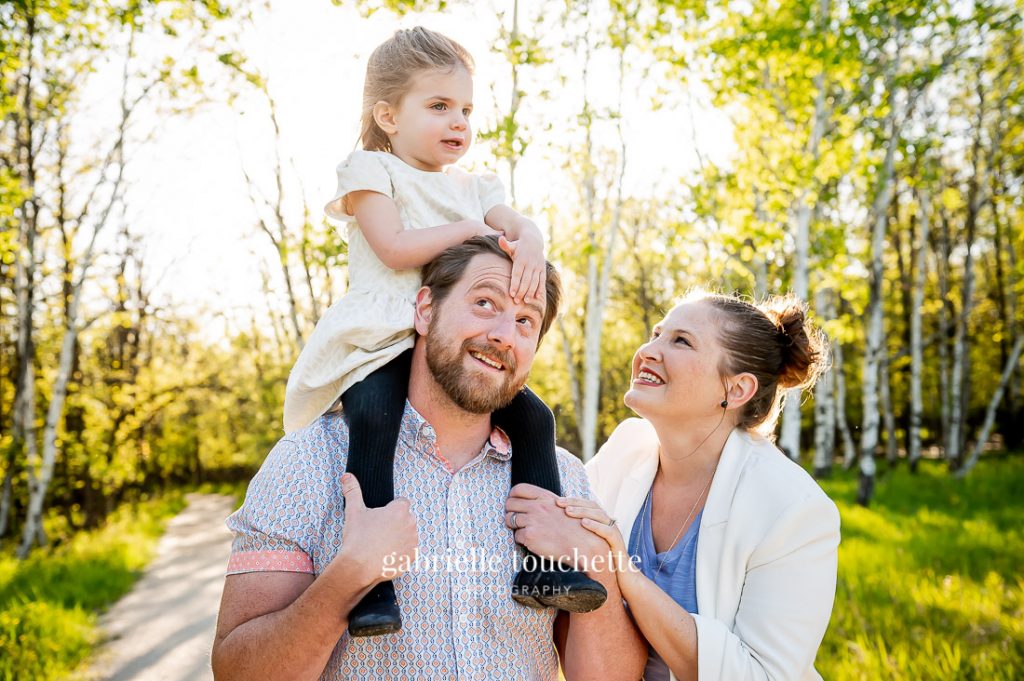 An urban Forest in the middle of Winnipeg with birch trees and walking paths through the woods perfect for family photo sessions