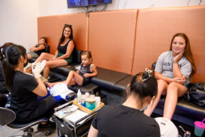 Mother and daughter enjoying nail services together