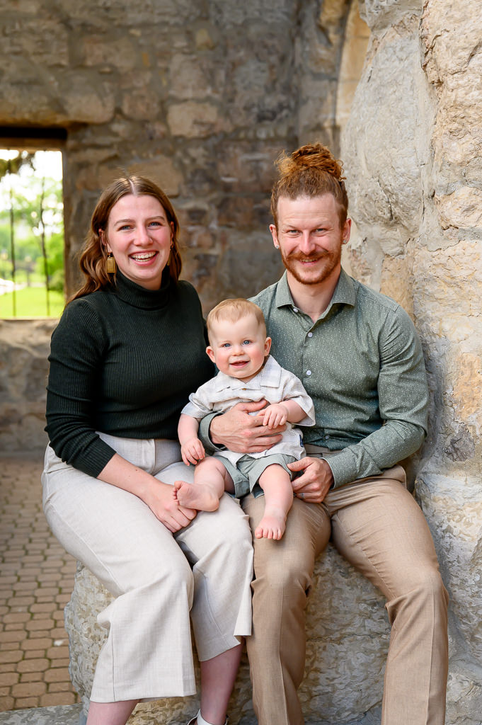 Young family posing for a photo at the St. Boniface Cathedral