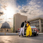 Couple posing together at Garry Street Parkade in Winnipeg