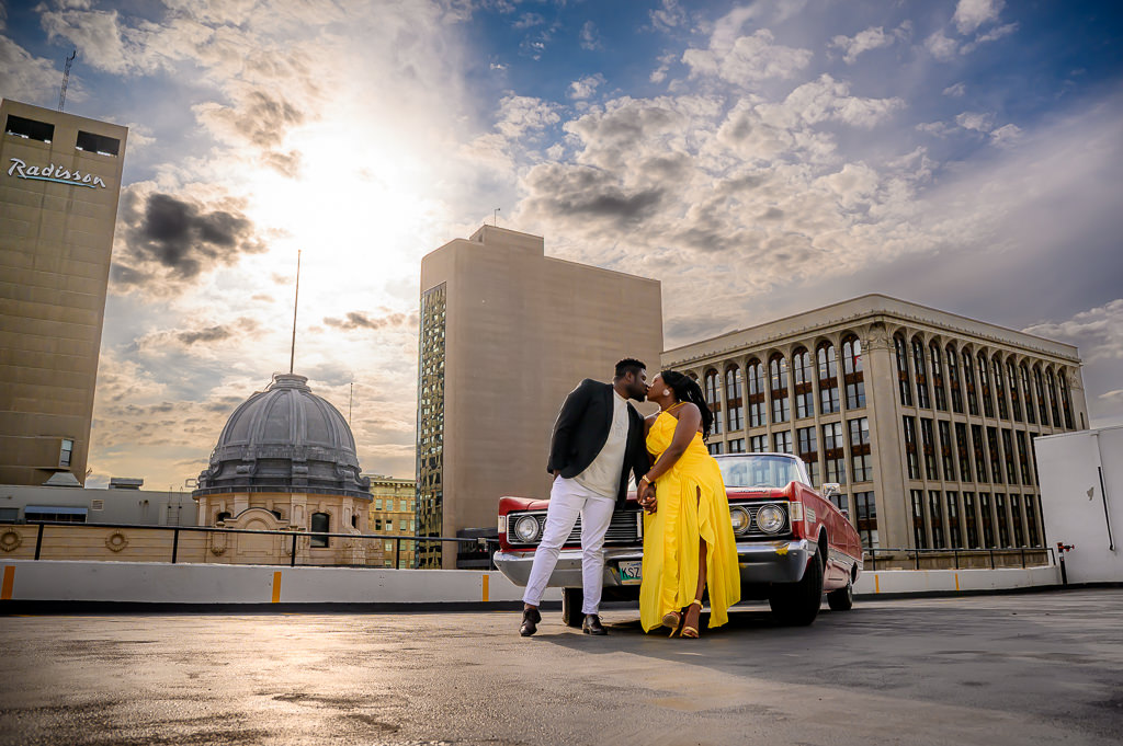 Couple posing together at Garry Street Parkade in Winnipeg
