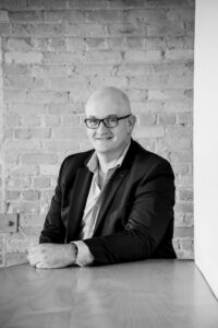 Winnipeg entrepreneur posing for professional headshots