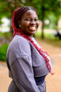Natural lifestyle headshot of a student on campus