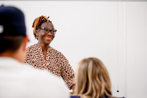 Marketing photography showcasing university students in campus spaces