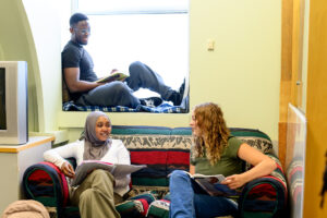 Students studying together in a bright university campus space
