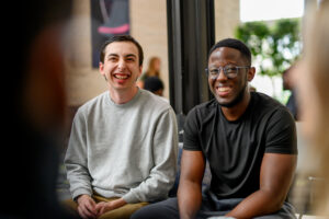Students enjoying time together in the university atrium