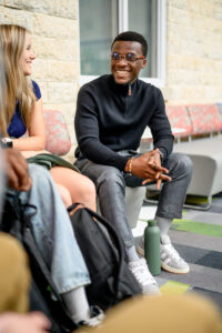 Students chatting together in a modern university space
