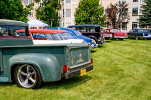 Editorial photo of classic car enthusiasts connecting at a Winnipeg community event