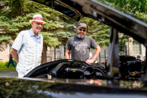Professional photographer in Winnipeg capturing environmental portraits of car enthusiasts