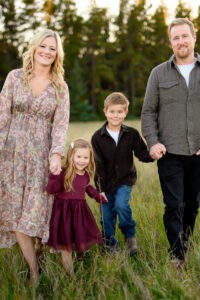 Family walking together at Birds Hill Park